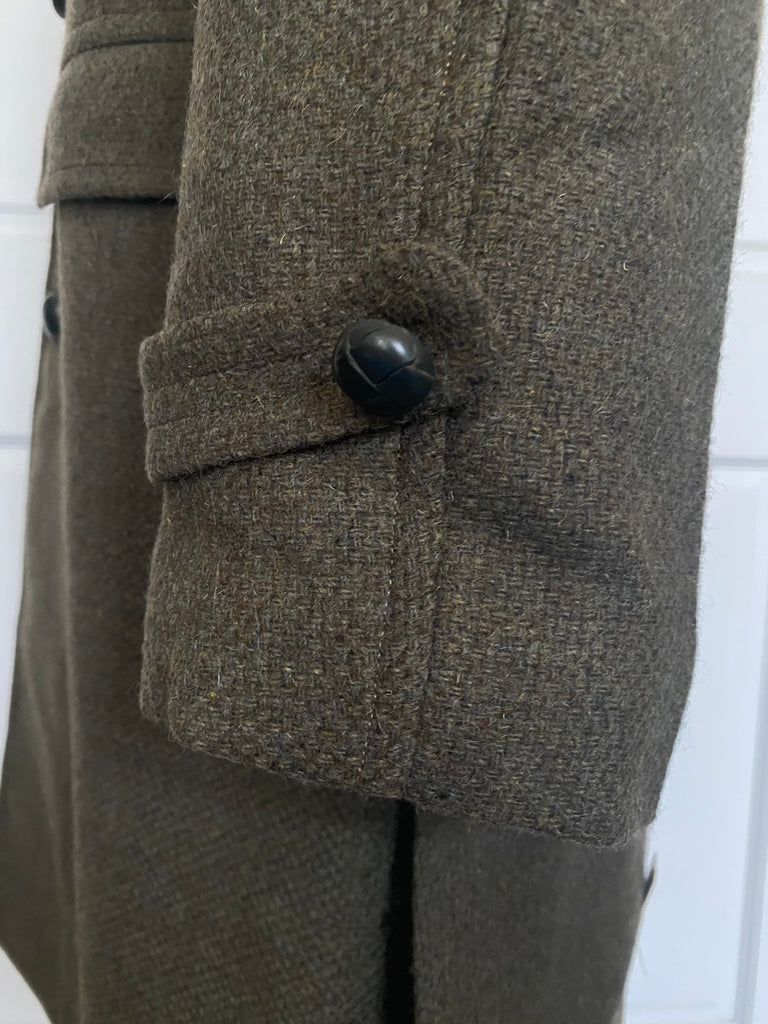 Men's vintage 1960's all wool overcoat with Barney's sale tags attached (never worn) , Amalgamated Union Made with a wool unremovable flannel lining for winter wear. Dark Olive/Grey color. Size Large 44 Regular.
