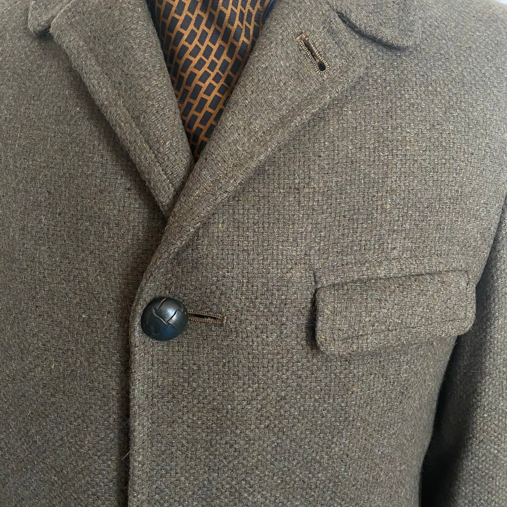 Men's vintage 1960's all wool overcoat with Barney's sale tags attached (never worn) , Amalgamated Union Made with a wool unremovable flannel lining for winter wear. Dark Olive/Grey color. Size Large 44 Regular.