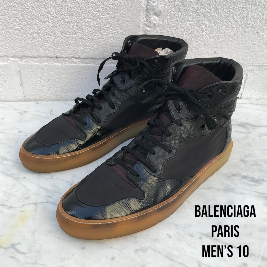 used pair of Balenciaga Paris Men's Black Leather Patchwork Trainer High Top Sneakers US Size 10 (43EU). Model - 330065 / Made in Italy.