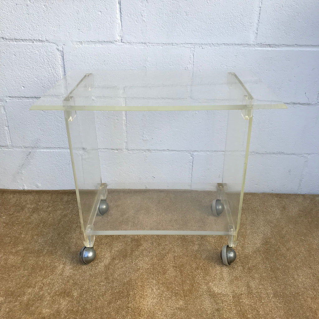 1960s Mid Century Modern Lucite Rolling Cart, Bar Cart, Side table, TV Stand, Plant Stand. Located in Astoria , Queens NYC. 