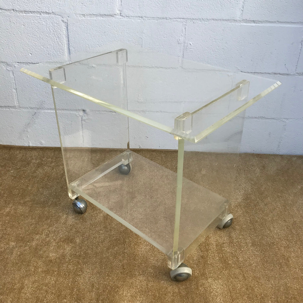 1960s Mid Century Modern Lucite Rolling Cart, Bar Cart, Side table, TV Stand, Plant Stand. Located in Astoria , Queens NYC. 