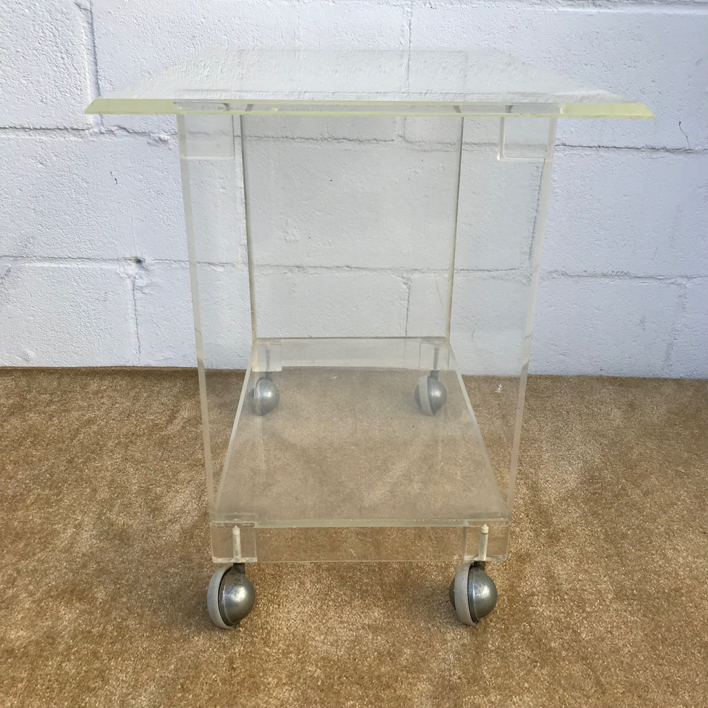 1960s Mid Century Modern Lucite Rolling Cart, Bar Cart, Side table, TV Stand, Plant Stand. Located in Astoria , Queens NYC. 