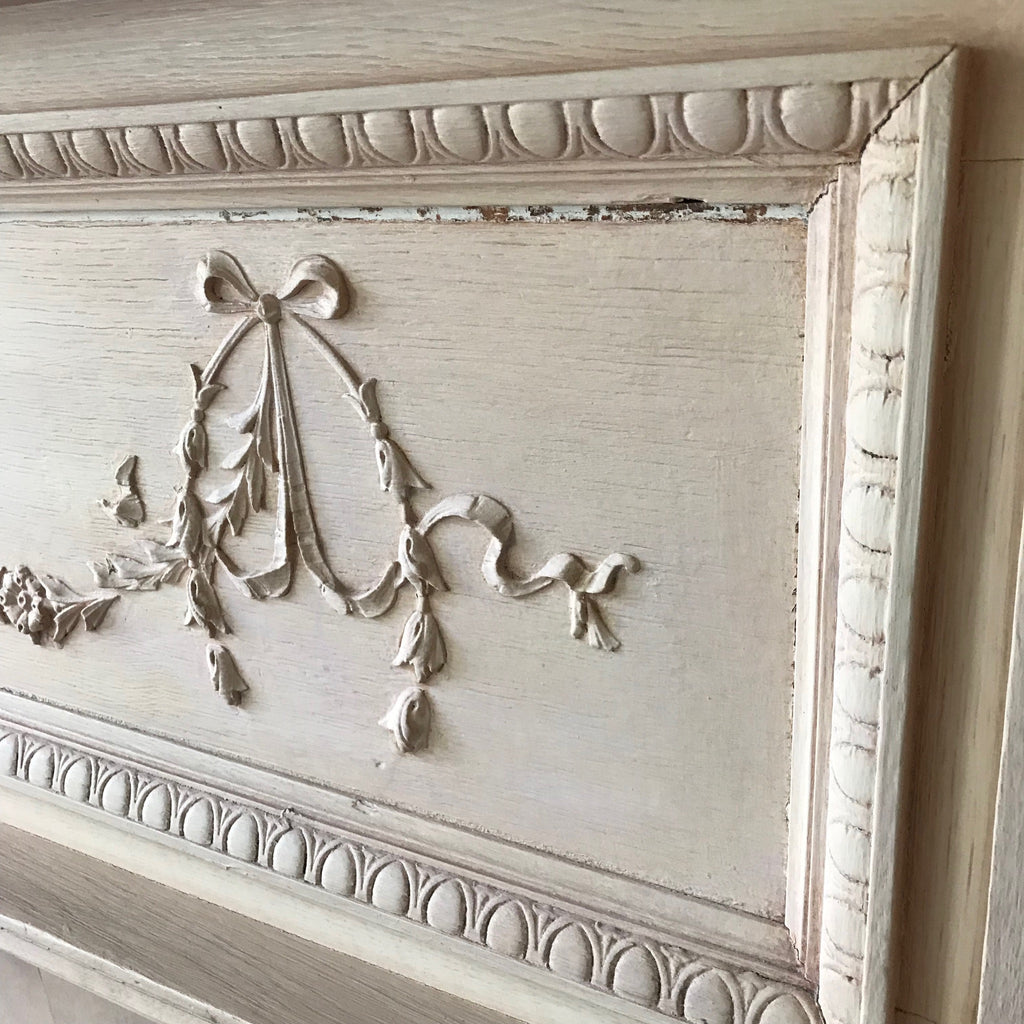 Antique French Solid Wood Carved wood Fire Place Mantel painted in cream, located in Astoria Queens NYC