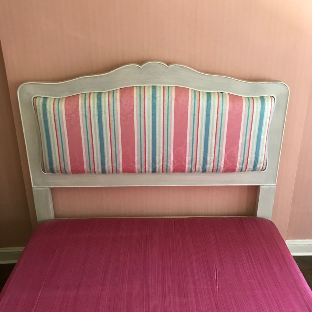 Vintage white and grey wood carved headboard with custom upholstery in pink, white, blue stripes, Full Size Box Spring with pink fabric to match. Located in Astoria Queens, NYC
