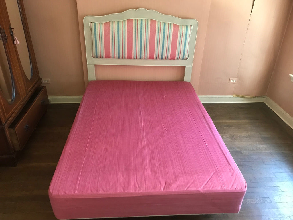 Vintage white and grey wood carved headboard with custom upholstery in pink, white, blue stripes, Full Size Box Spring with pink fabric to match. Located in Astoria Queens, NYC
